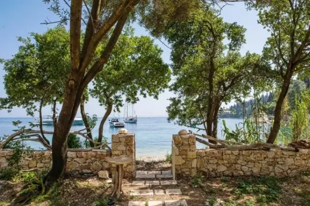 THE BEACH HOUSE, 
📍Agni, Corfu

Sleeping up to 12 guests across 6 en-suite bedrooms, The Beach House has one of the most enviable settings on Corfu, with direct access to Yialiskari beach and the Ionian Sea just beyond the garden.

The elegant, contemporary villa centres around a 12m infinity pool, with generous terraces for dining and relaxing, a BBQ area and uninterrupted views across the bay. There is also a private jetty, with paddleboards, a kayak and snorkelling equipment provided for exploring the coastline.

Agni and Kalami are both within an easy five-minute walk, putting their waterfront tavernas within reach while allowing The Beach House to retain its wonderfully private, secluded feel.

Available for up to 12 guests, with a chef and assistant included during July and August, The Beach House offers everything you could possibly need for a relaxed Corfiot getaway with family or friends.

For more details or to book direct please email info@ionianestates.com or call 44 (0) 7540 472 746

#CorfuVilla
#CorfuGreece
#IonianEstates
#Luxuryvilla
#LuxuryVillacorfu
