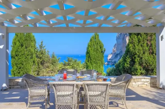 Sargasso
📍Magazia, Paxos

Set above Erimitis beach on the west coast of Paxos, Sargasso is a stunning and secluded five-bedroom villa sleeping up to 10 guests. 

Generous living spaces open onto large terraces and a spectacular 12m infinity pool overlooking the Ionian Sea. The views extend across the dramatic white cliffs of Erimitis and the wooded hills beyond, creating an exceptional setting for long lunches and sunset drinks.

The beautifully landscaped gardens are an important part of Sargasso’s appeal, with sweeping lawns and orchards planted with orange, lemon, lime, grapefruit and pomegranate trees. A hillside path leads directly to beautiful Erimitis beach with its turquoise waters and dramatic white cliffs. 

The villa is just a very short drive from Magazia, with its tavernas, kafenion, bakeries and supermarket. The perfect setting for a relaxing holiday where you can truly unwind. 

For more details please contact:
Info@ionianestates.com or call: 44 (0) 7540472746

#IonianEstates
#Paxos
#paxosvilla #erimitis #LuxuryGreekVilla